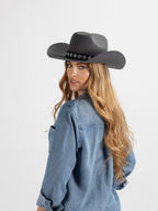 Model wearing Burera handmade cowboy hat, front view